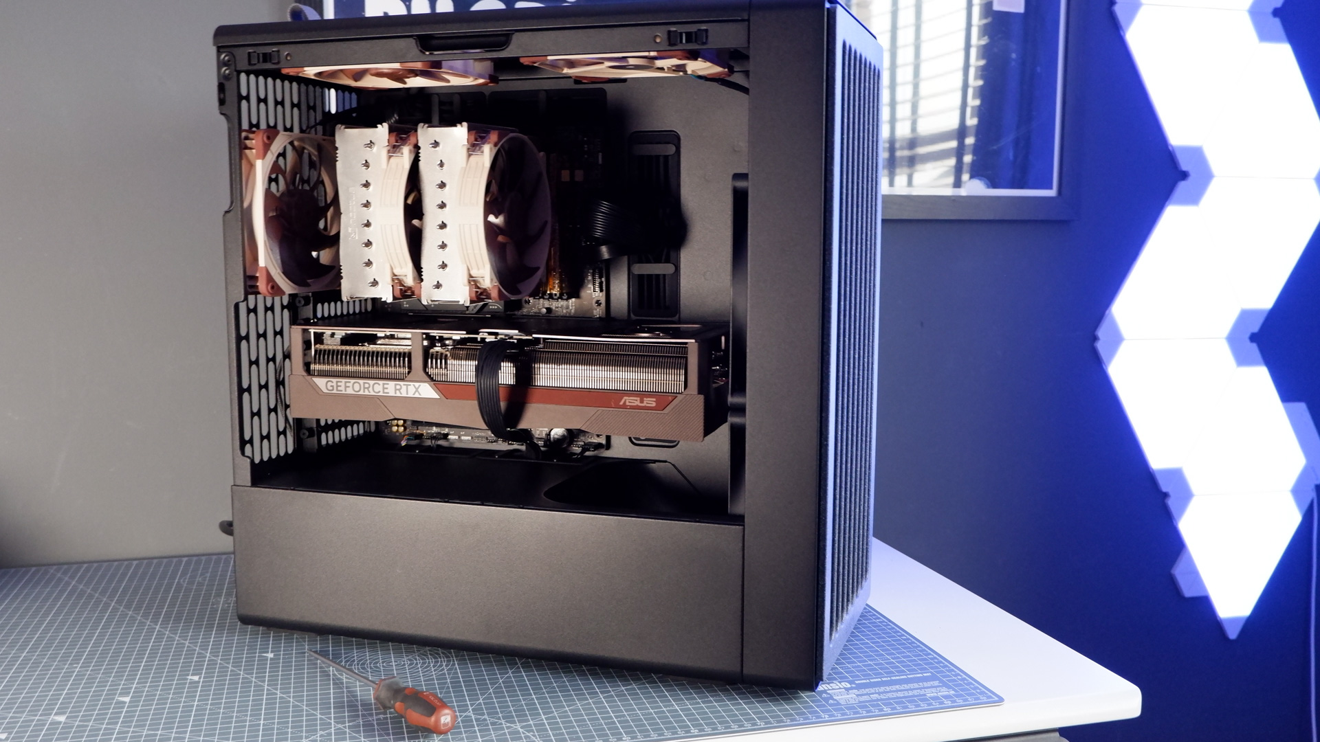 A huge Asus RTX 5080 Noctua Edition GPU with a matching Noctua gaming PC.