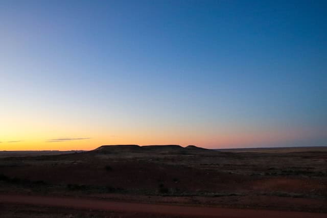sunset, desert, rock, and south australia in Coober Pedy