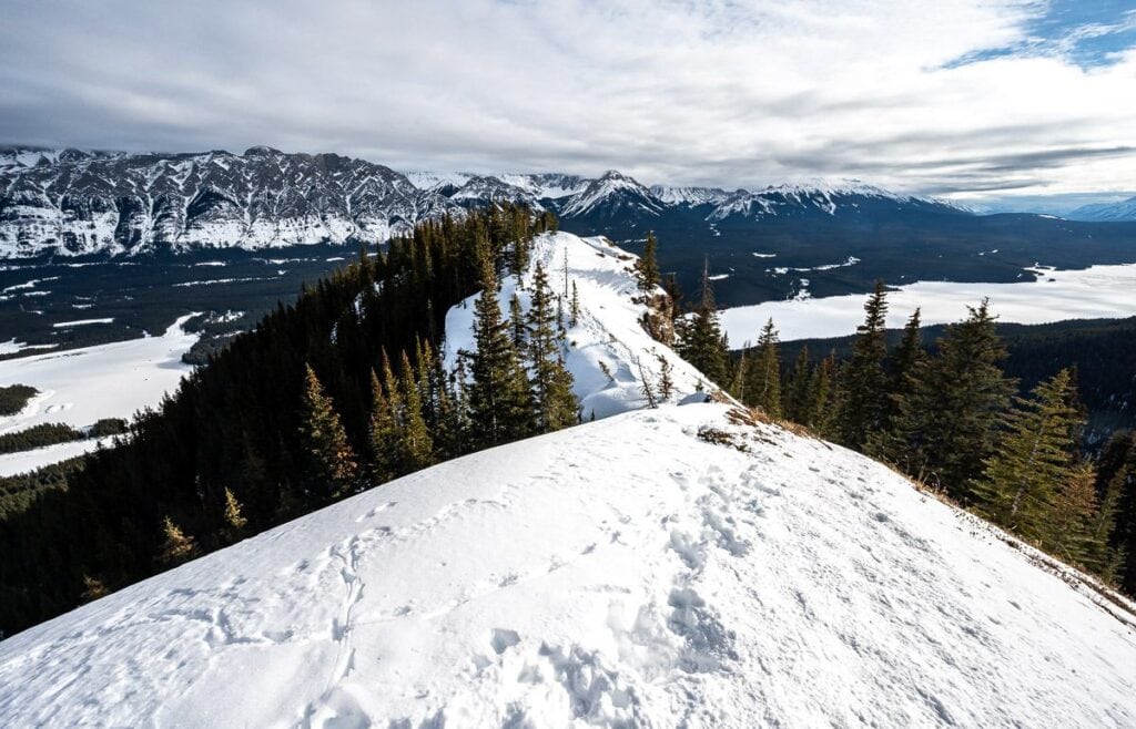 A wide-angle view showing the drop-off on either side of Gypsum Ridge in Peter Lougheed Provincial Park