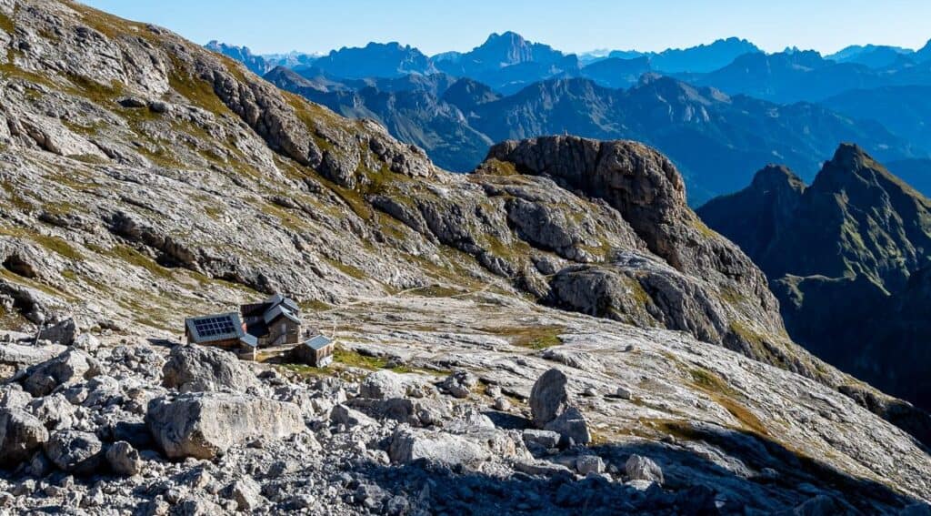 Looking down at the Mulaz Hut from the trail to Rosetta Hut