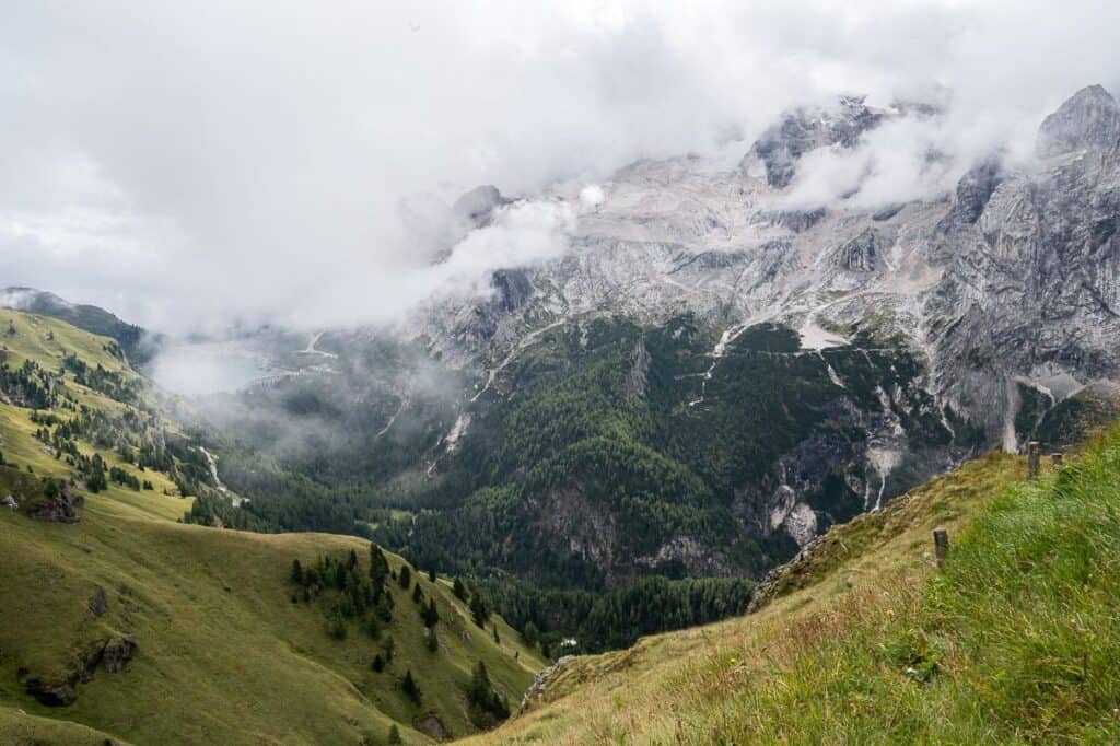 Looking down to Lago di Fedaia  - our goal is a bus that travels beside the reservoir
