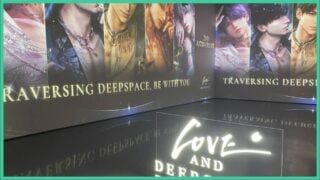 Image shows a room with a projection of the Love and Deepspace characters on the wall.