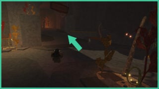 The pathway to the Volcanic Depths which has a wooden sign that says DANGER within the Ruined Cave in The Forge.