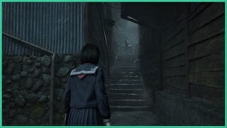 Hinako approaches a set of stairs in Silent Hill F, as a creepy mannequin stands at the top holding a knife.