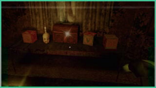 The toy blocks next to the chest, arranged to spell out EVA in Dollhouse Bloodshed.