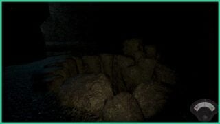 The cave system in Hypoxiphobia, with a crevice ahead, surrounded by darkness.