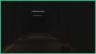A very dark hallway in a facility, with small beams of light on the ceiling and yellow lines on the ground in OBSCURE.