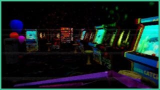 A blurry VHS-style image of the arcade from the mall in Blood Mall. The arcade is mostly dark apart from the bright screens and there are balloons to the left.