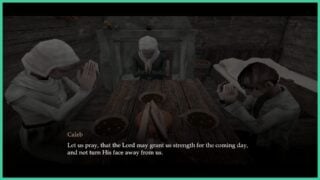 Caleb and his family sit at a table and pray in FATHER. The room is dark, and with bowls full of food on the table, he and his family clasp their hands together in prayer.