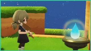 A Petit Planet player holding a shovel whilst facing a Lucadrop, which is a blue, glowing droplet atop a pedestal.