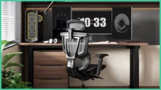 The FlexiSpot E7 Plus with three monitors, a PC, a monitor arm, headphones, a keyboard and a mouse. 