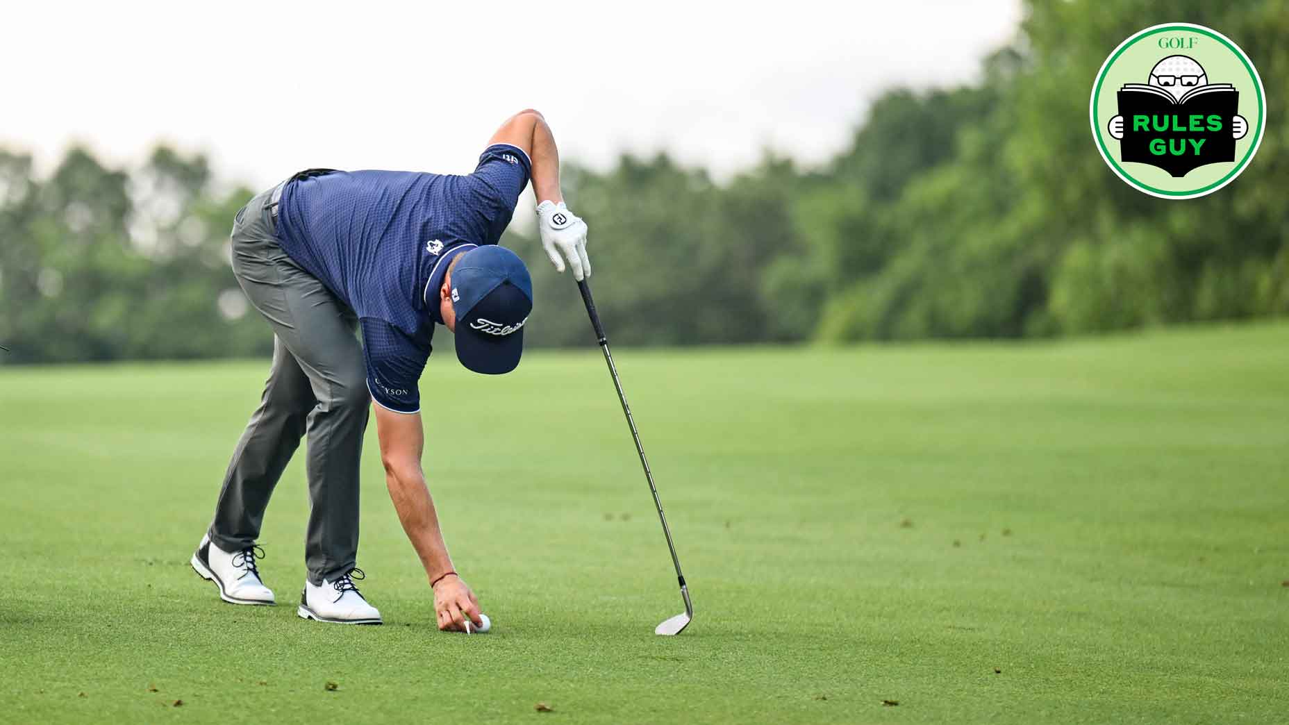 Justin Thomas places his ball with preferred lies in effect on the 14th hole after heavy rainfall during the third round of the Travelers Championship at TPC River Highlands on June 22, 2024, in Cromwell, Connecticut. (