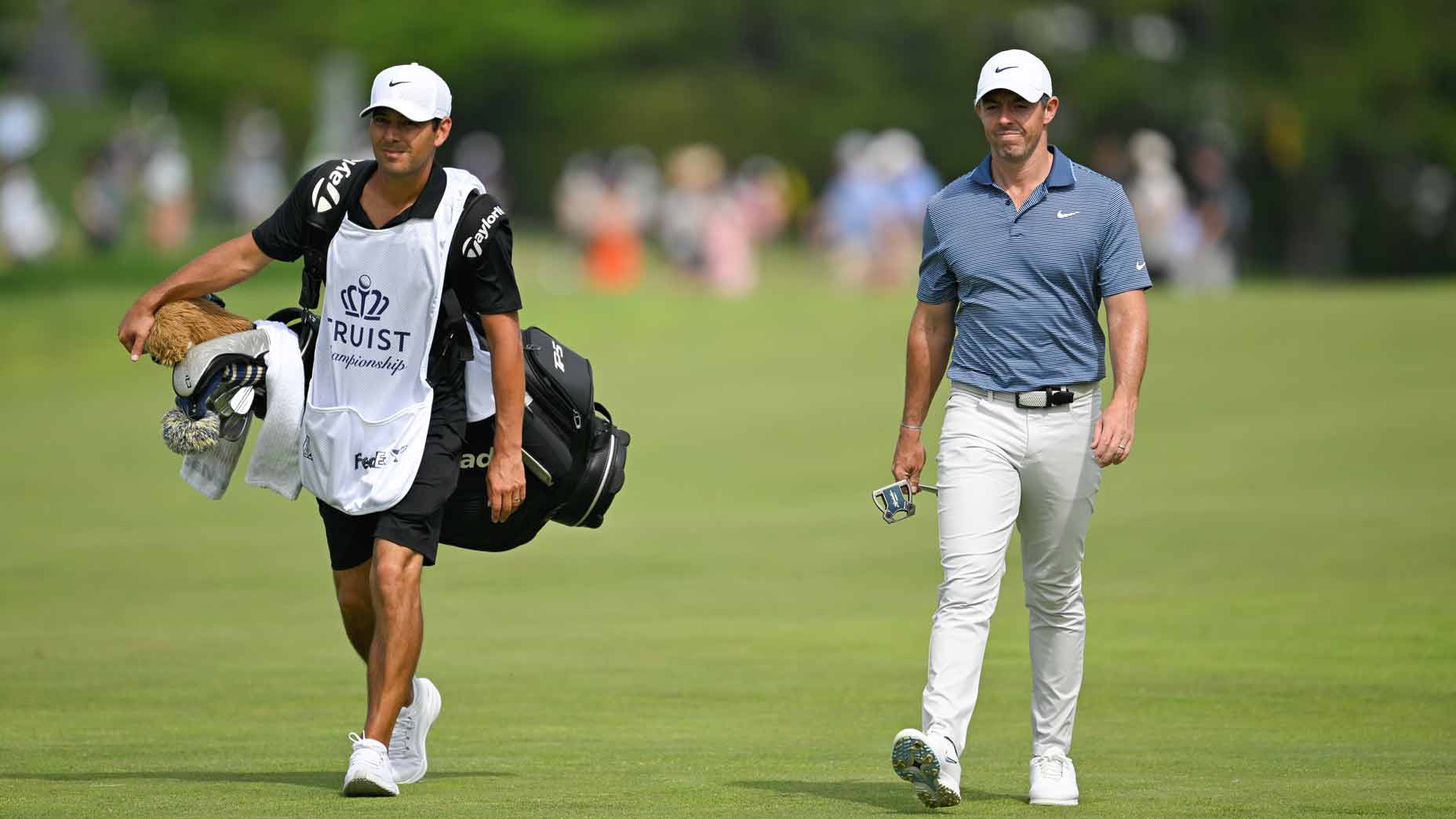 2026 Truist Championship odds; Rory McIlroy walks with caddie at Truist PGA Tour event.