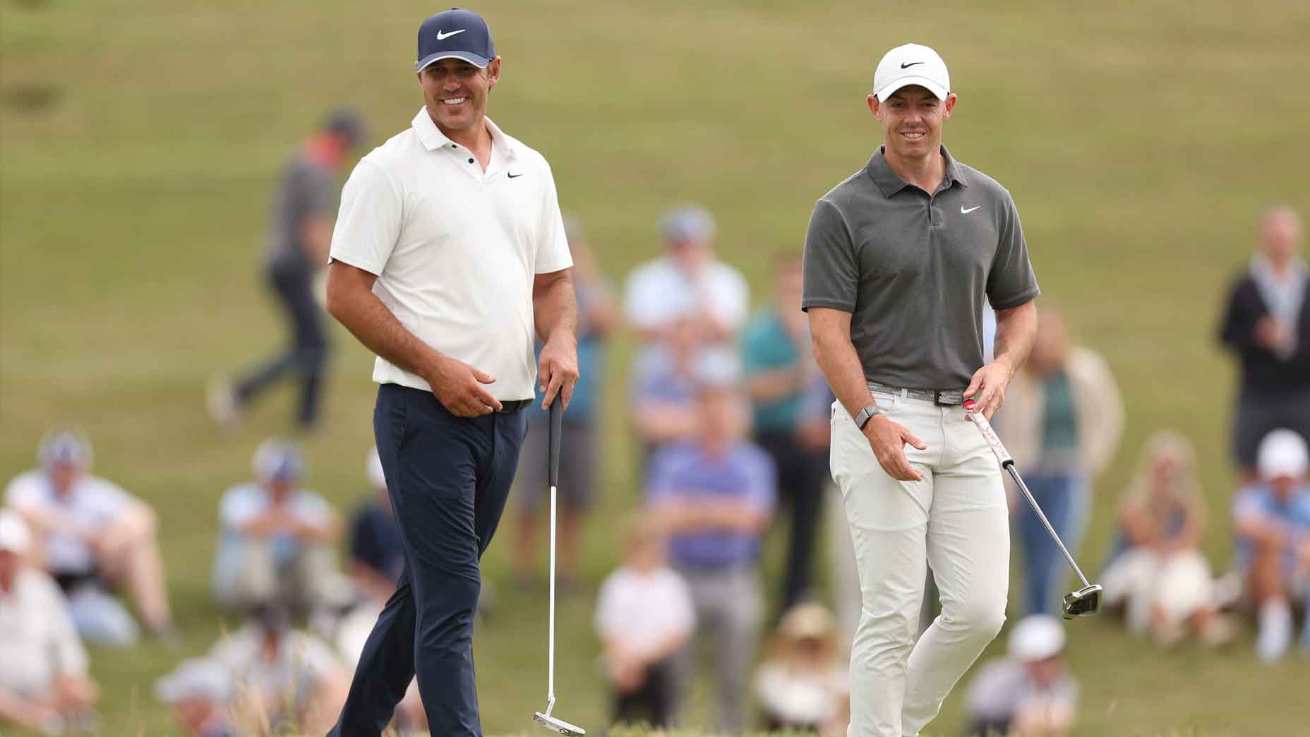 Rory McIlroy and Brooks Koepka look on during the 2023 U.S. Open