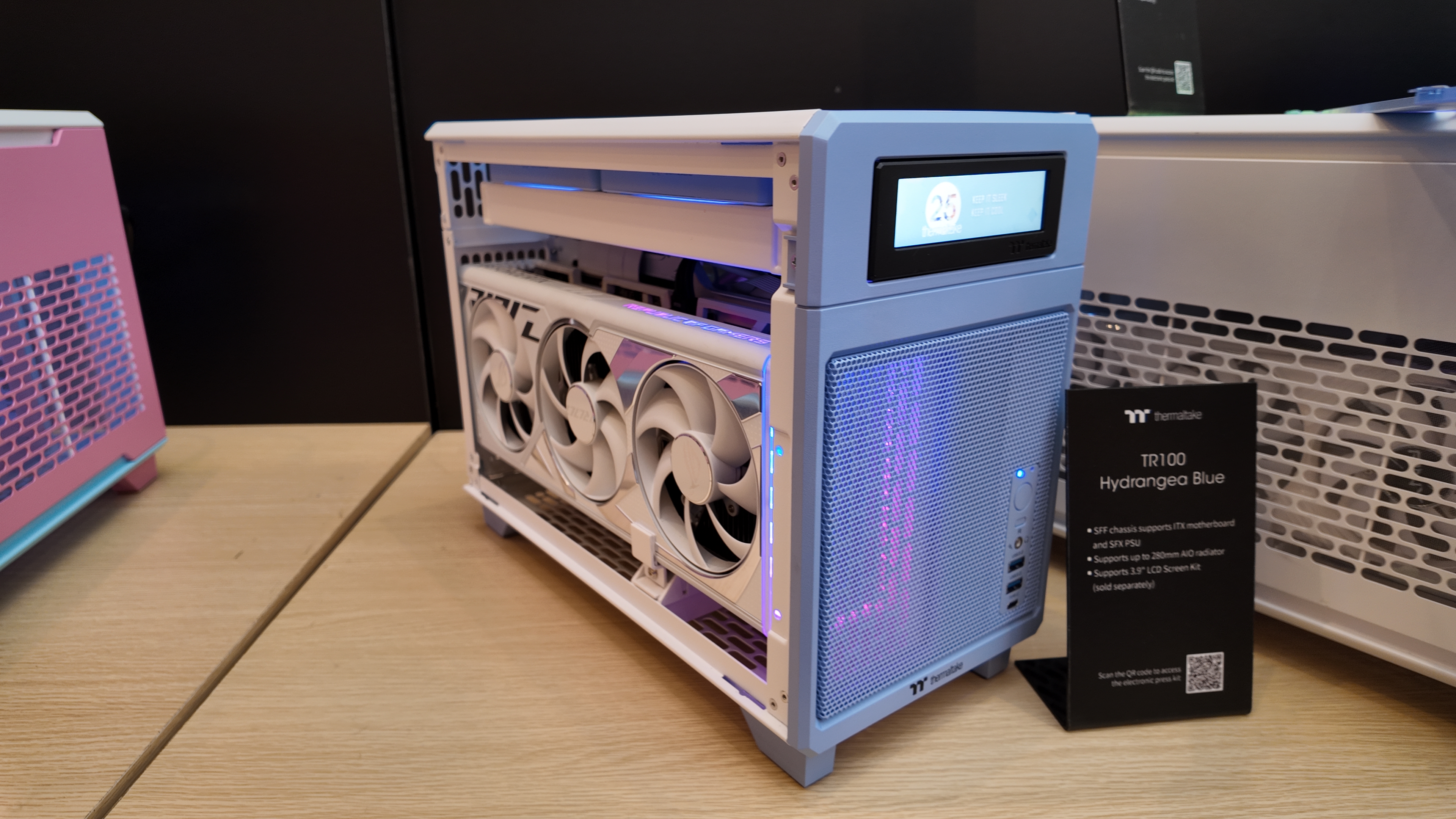 Thermaltake's brightly coloured PC cases at its CES 2025 booth.