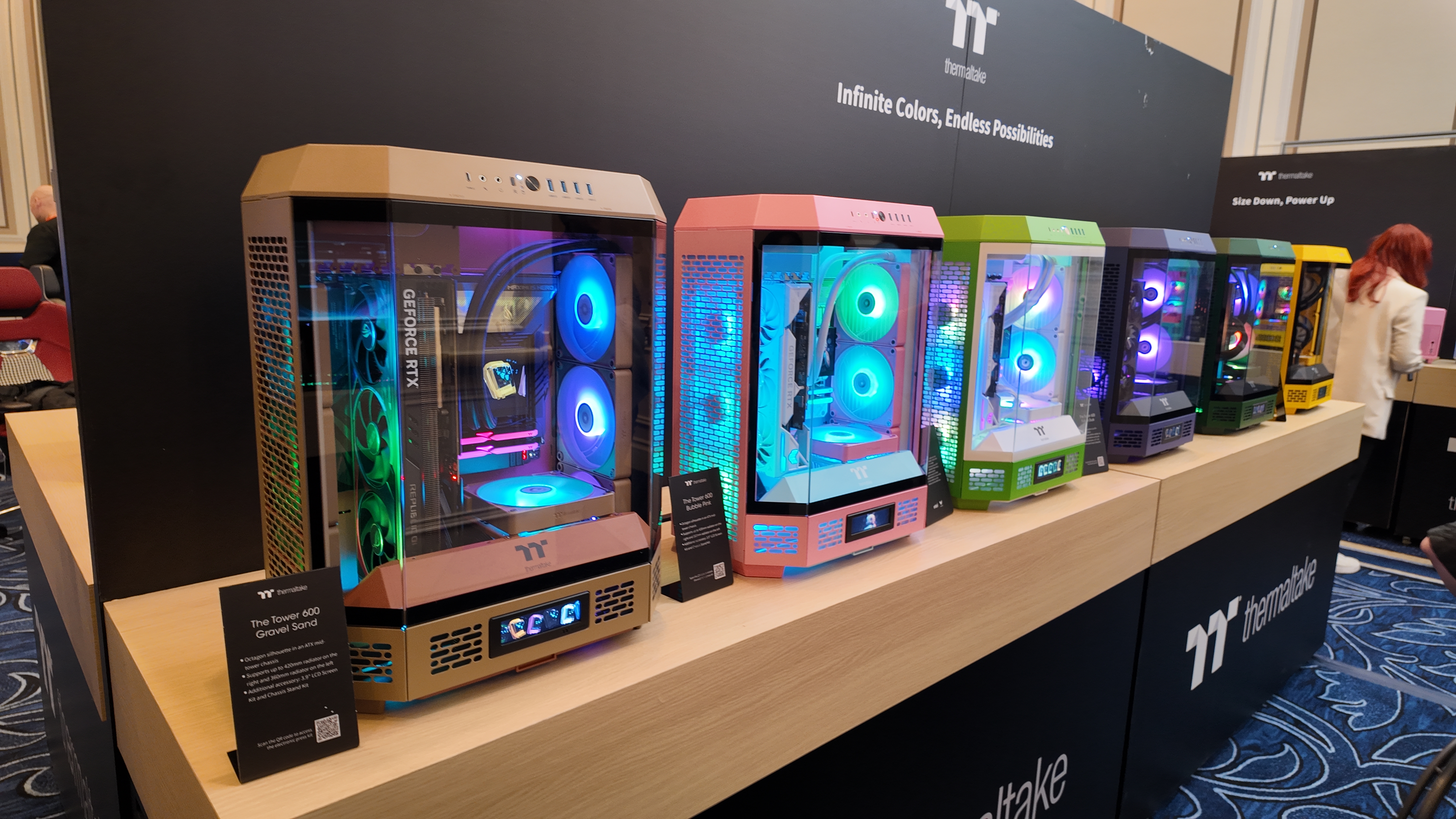 Thermaltake's brightly coloured PC cases at its CES 2025 booth.