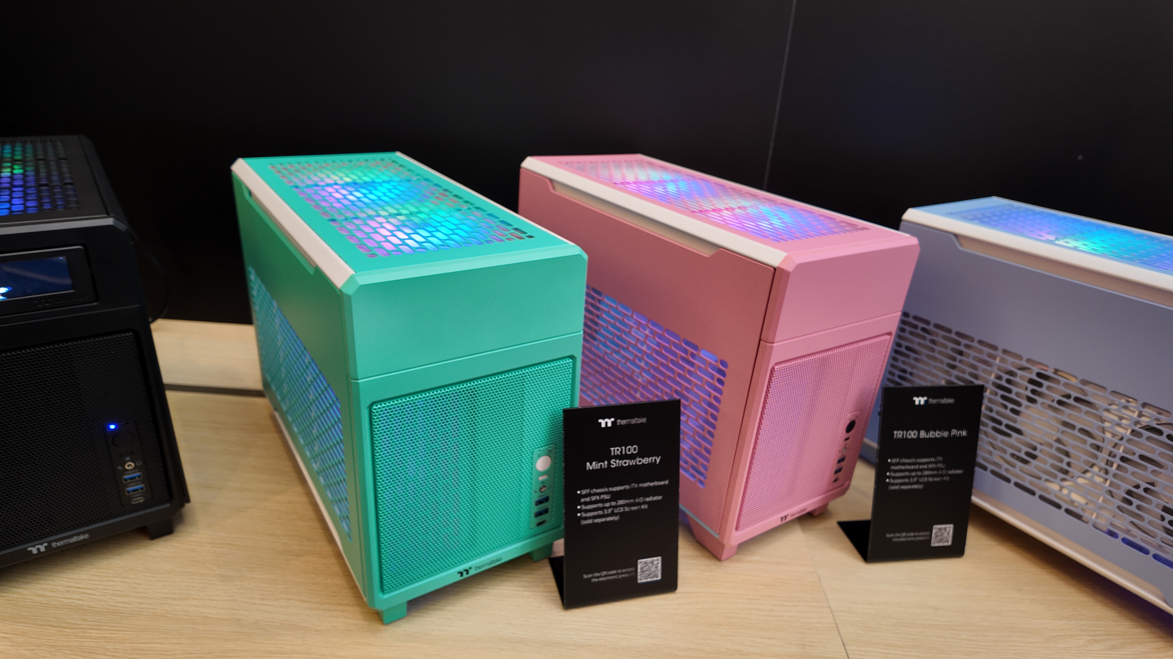 Thermaltake's brightly coloured PC cases at its CES 2025 booth.