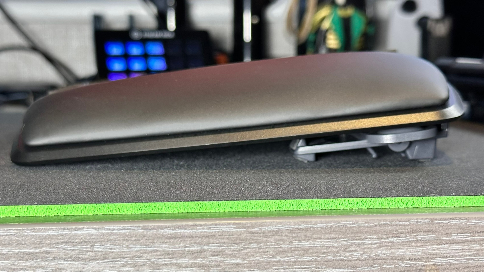 A side view photograph of the Kinesis Gaming Freestyle Edge RGB Plus ergonomic keyboard, showing the lift kit set to 5 degrees