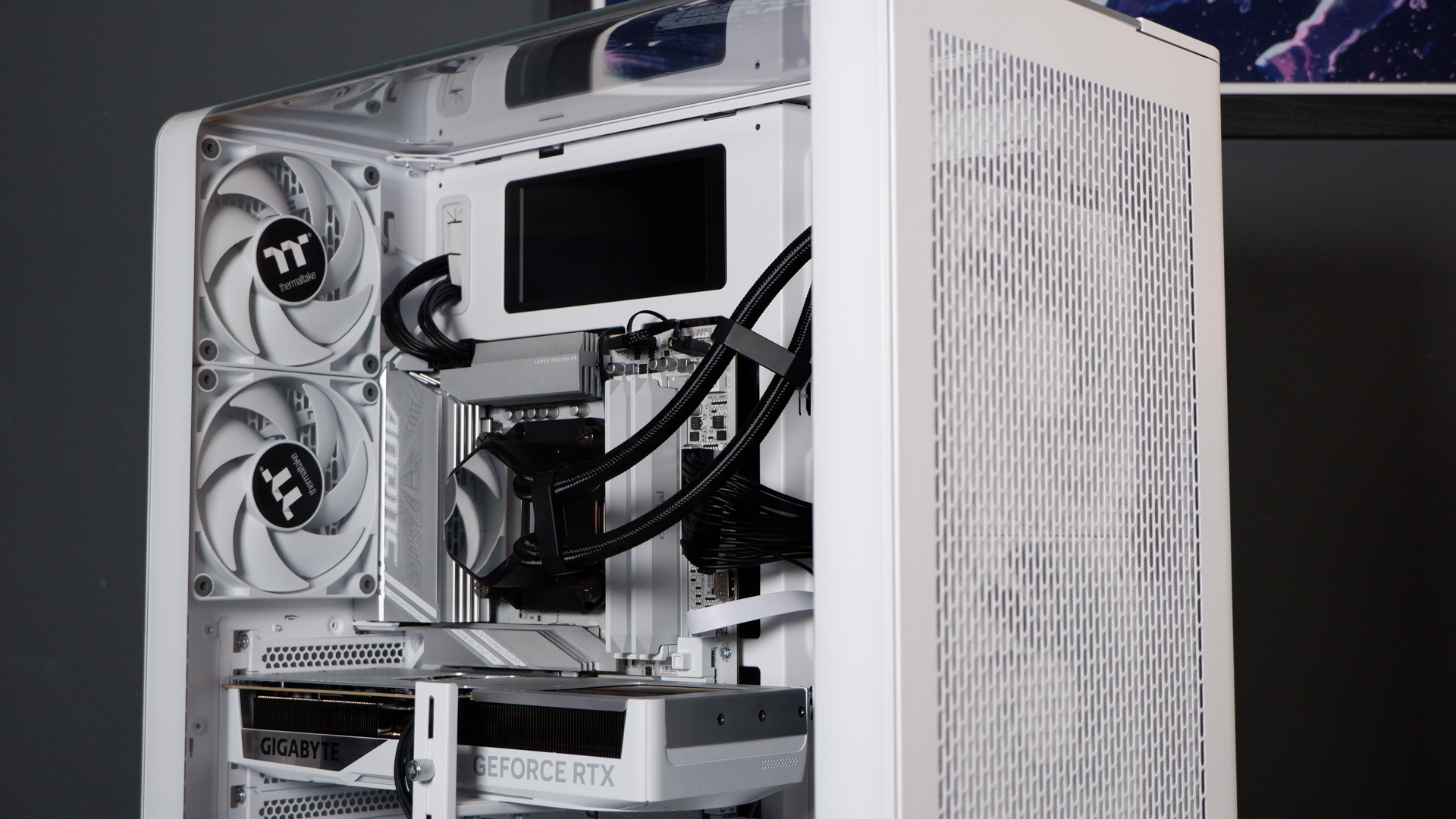 Thermaltake View 390 Air chassis on a desk. We're building a PC into it for testing and comparison with other PC cases.