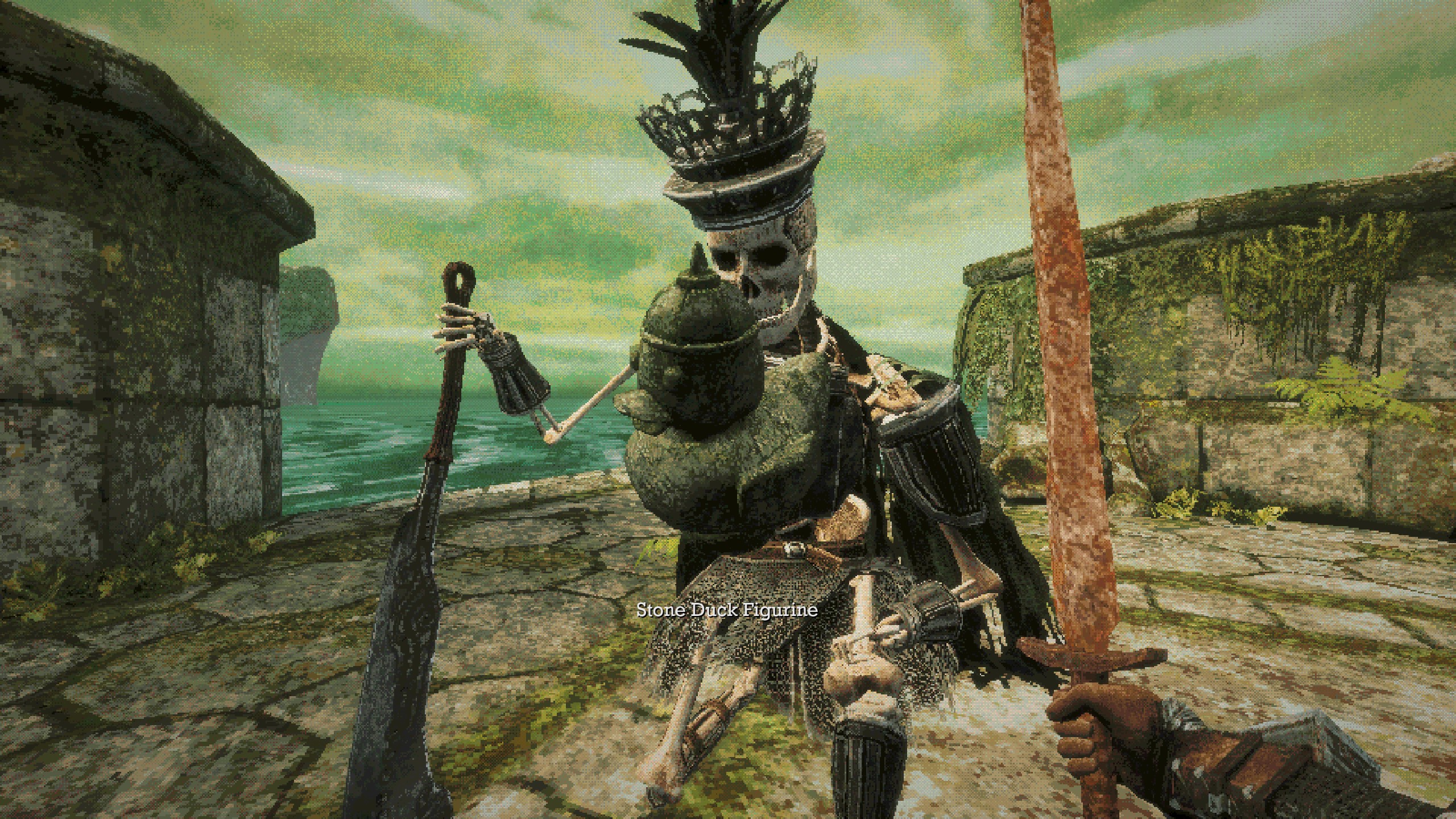 Skeleton boss man kneeling, resting on sword after defeat in Queen's Domain.