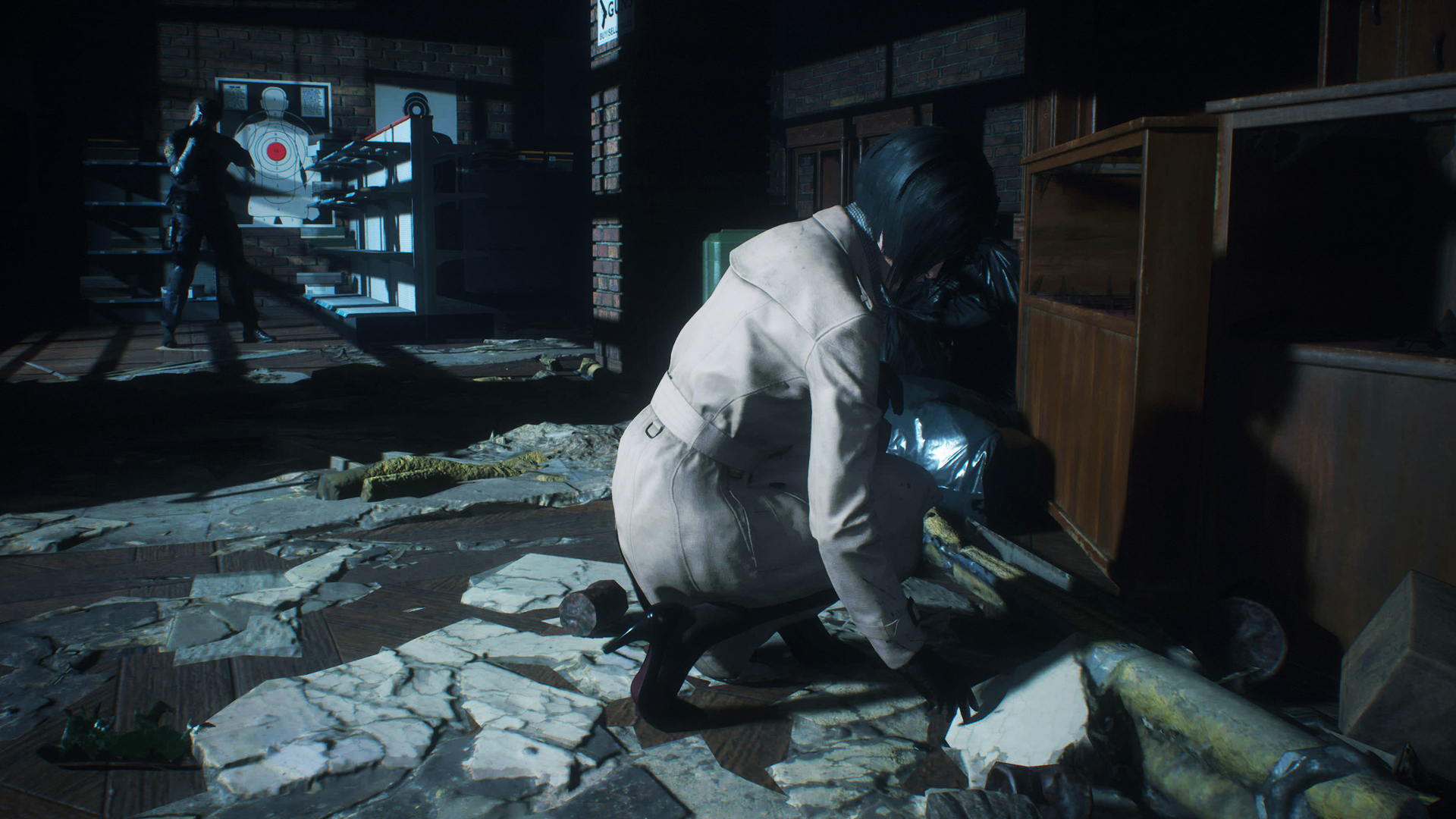 Resident Evil 2 Remake - Ada knelt down checking something on the floor