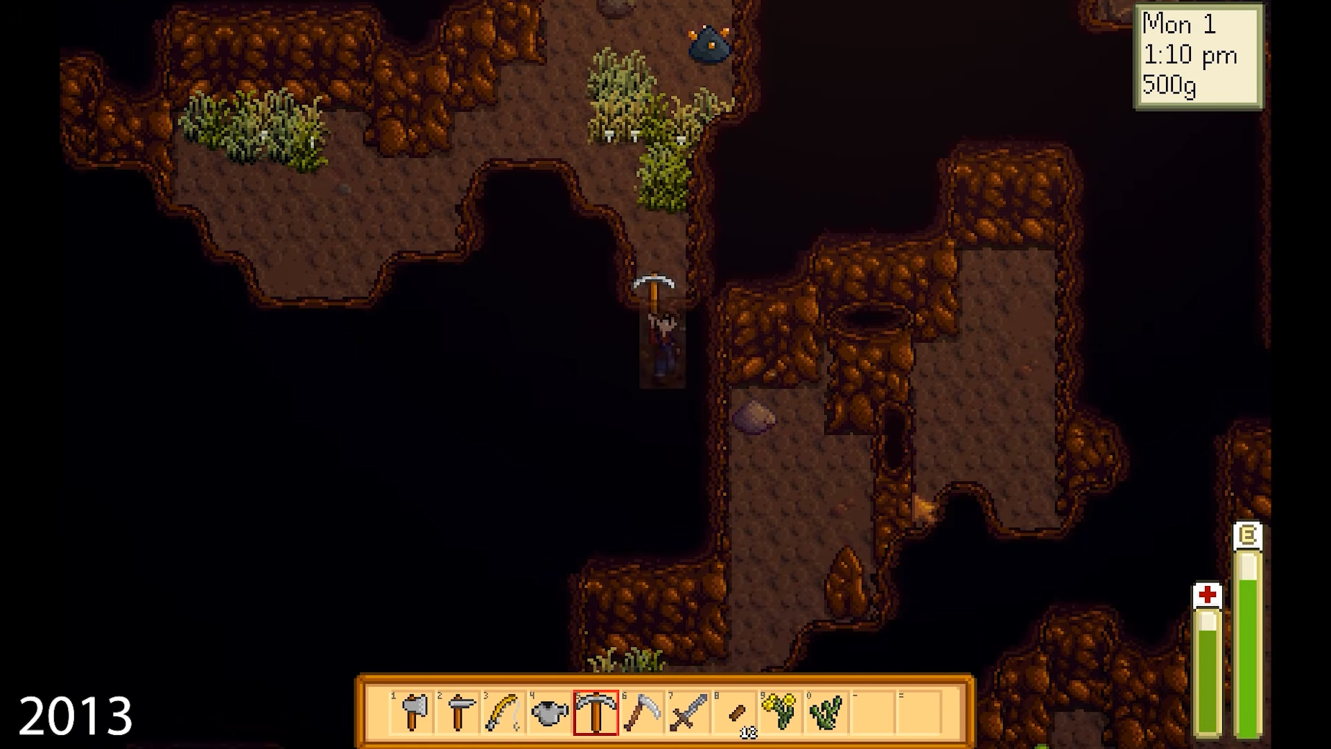 A screenshot from an early development build of Stardew Valley, showing the player digging through mine walls in a procedurally-generated level.