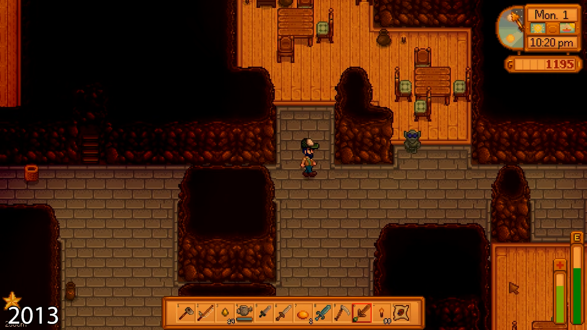 A player walking through a scrapped underground goblin village region in an early development build of Stardew Valley.