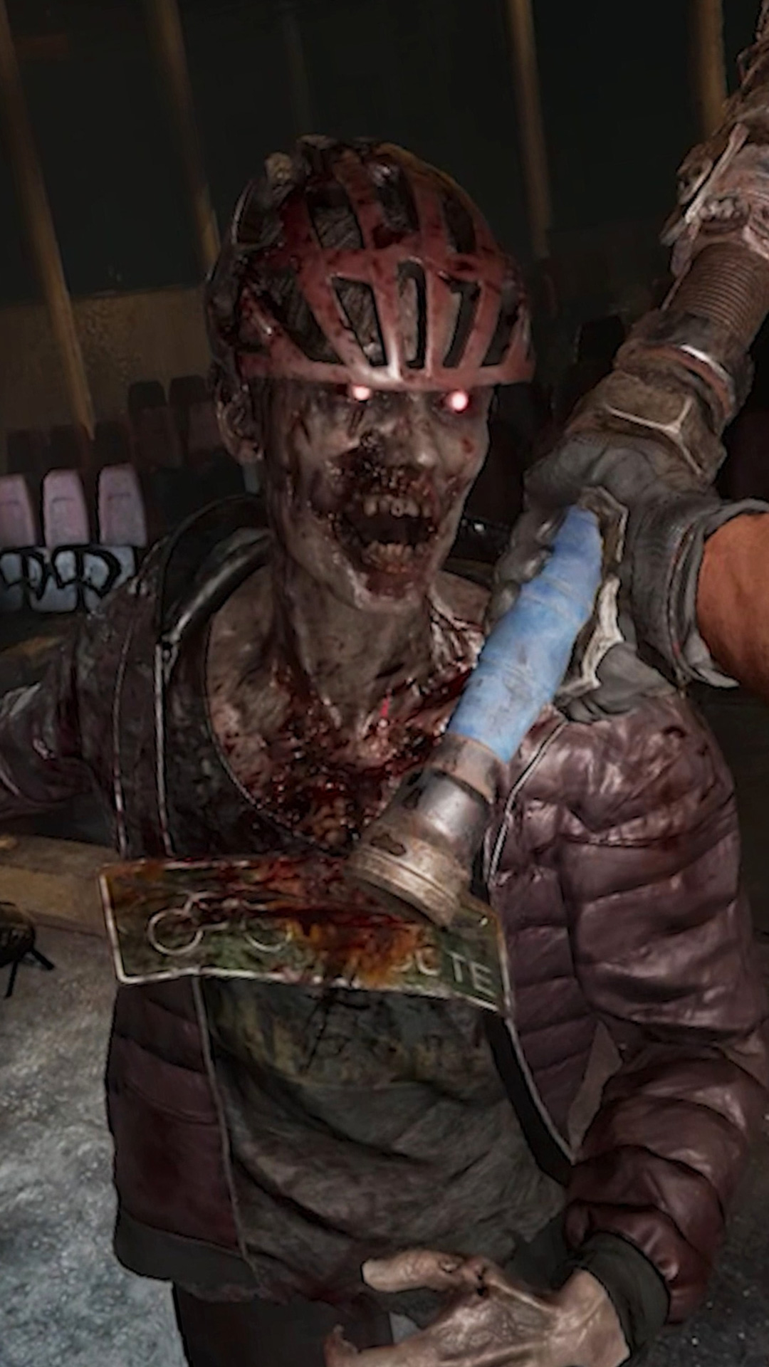 A player from The Midnight Walkers hitting a zombie with a pipe