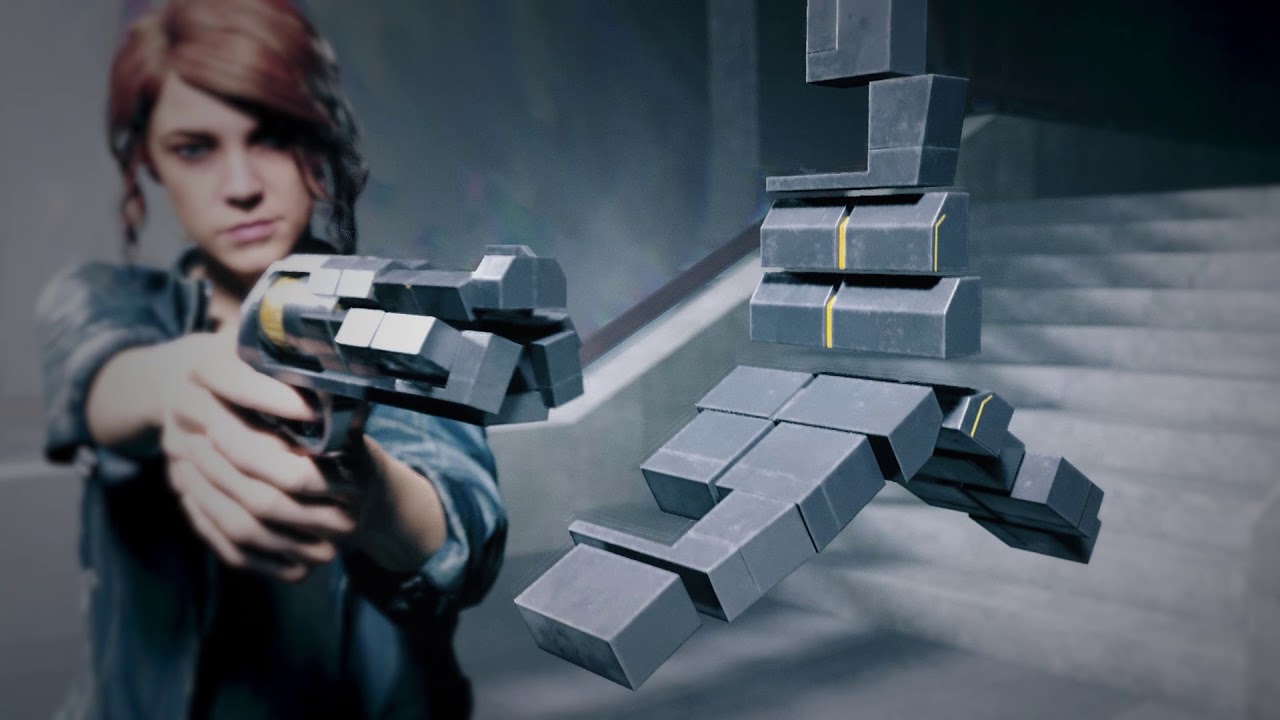 The protagonist of Control holding a gun