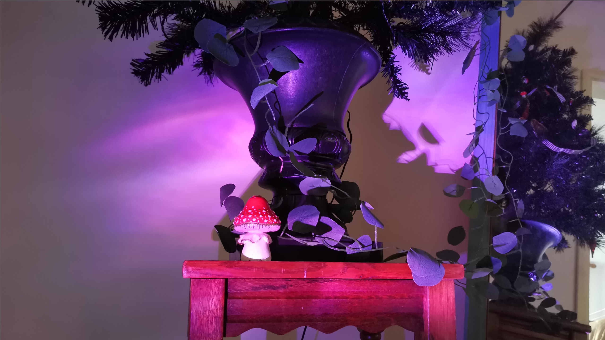 The XGIMI MoGo 4 Laser projector set-up with various accessories.