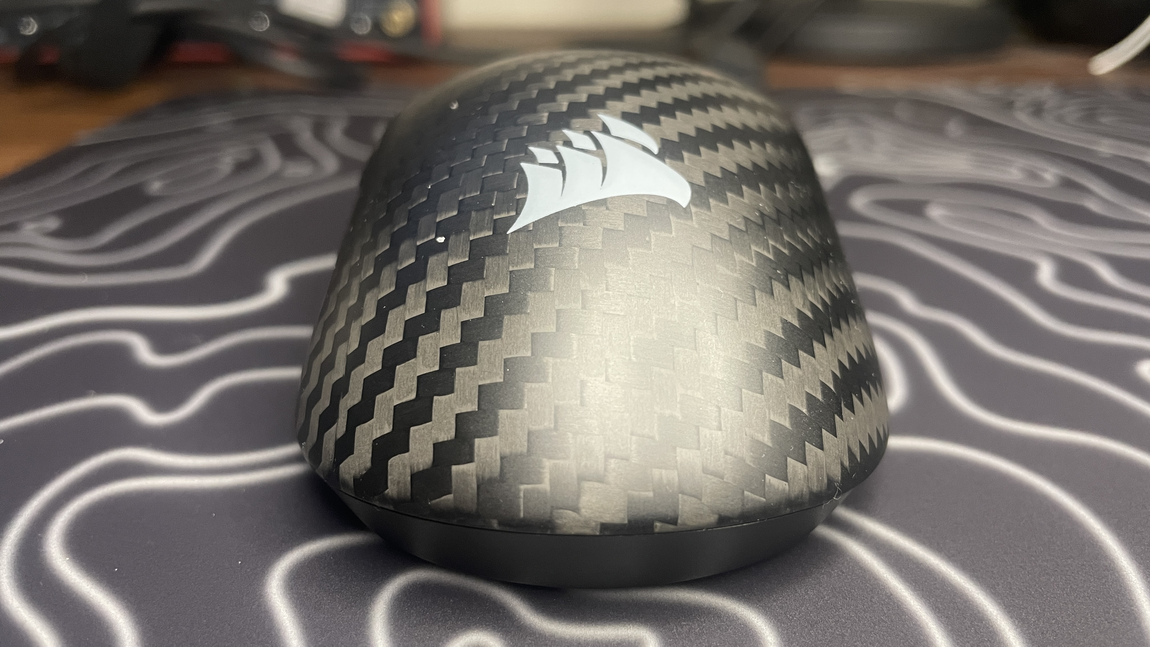 A Corsair Sabre V2 Pro Wireless CF gaming mouse.