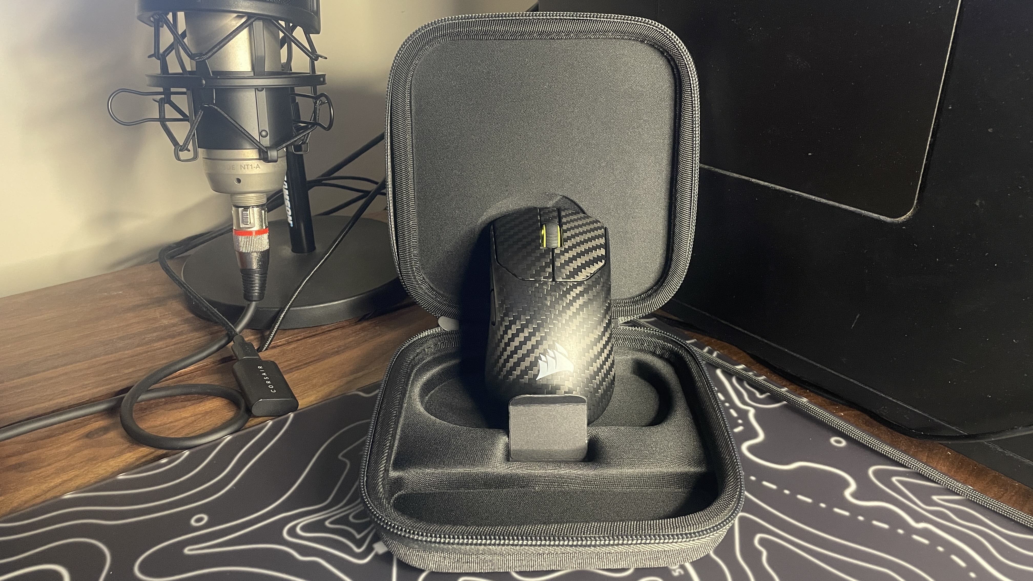 A Corsair Sabre V2 Pro Wireless CF gaming mouse.