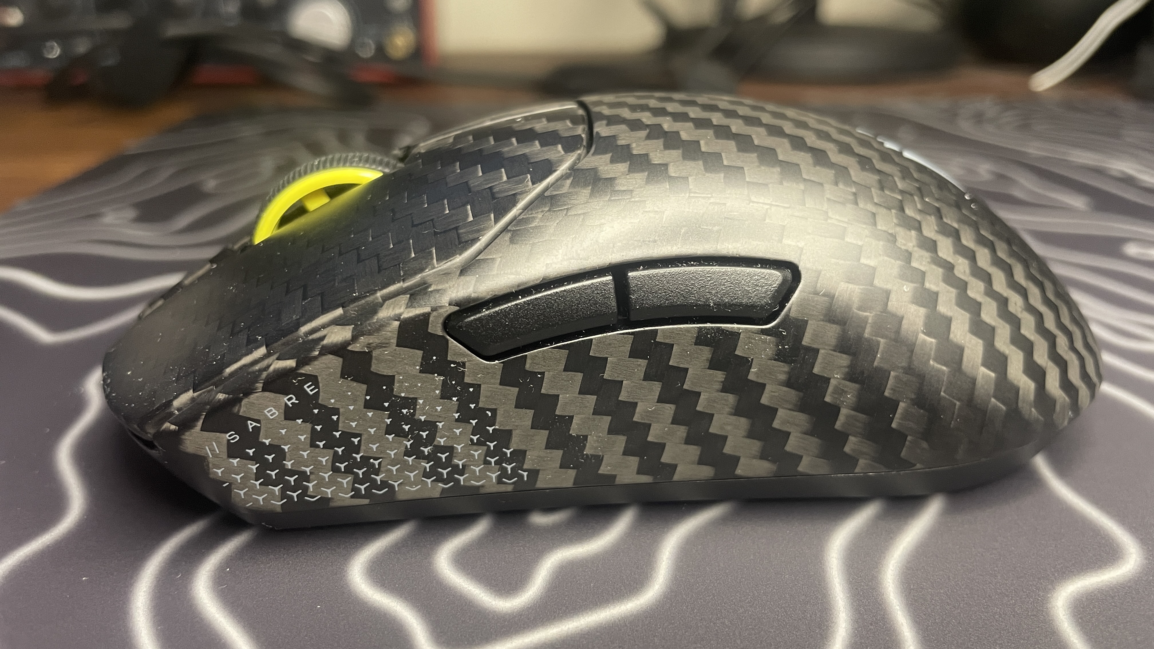 A Corsair Sabre V2 Pro Wireless CF gaming mouse.