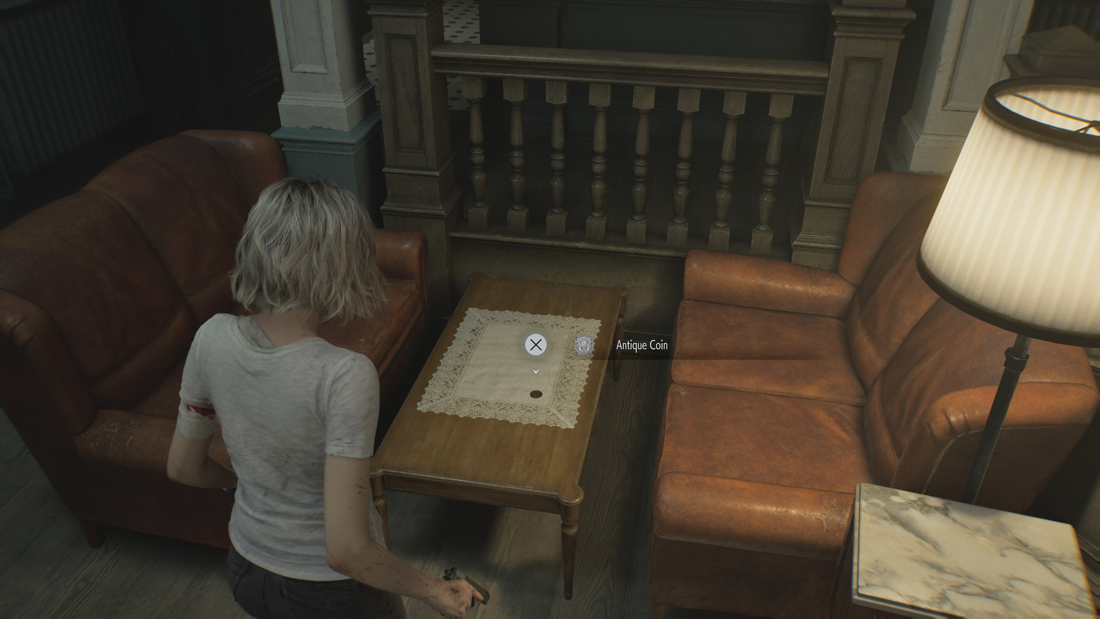 Resident Evil Requiem Antique Coin on a table