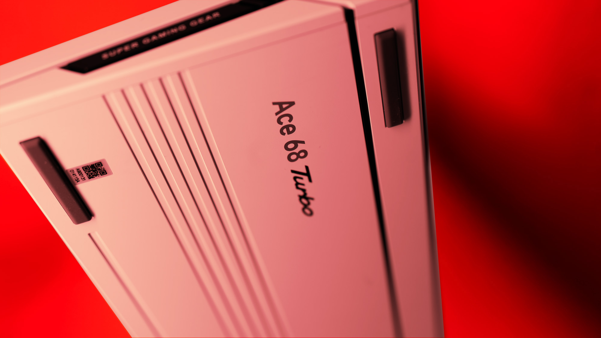 The Mchose Ace 68 Turbo on a red background.