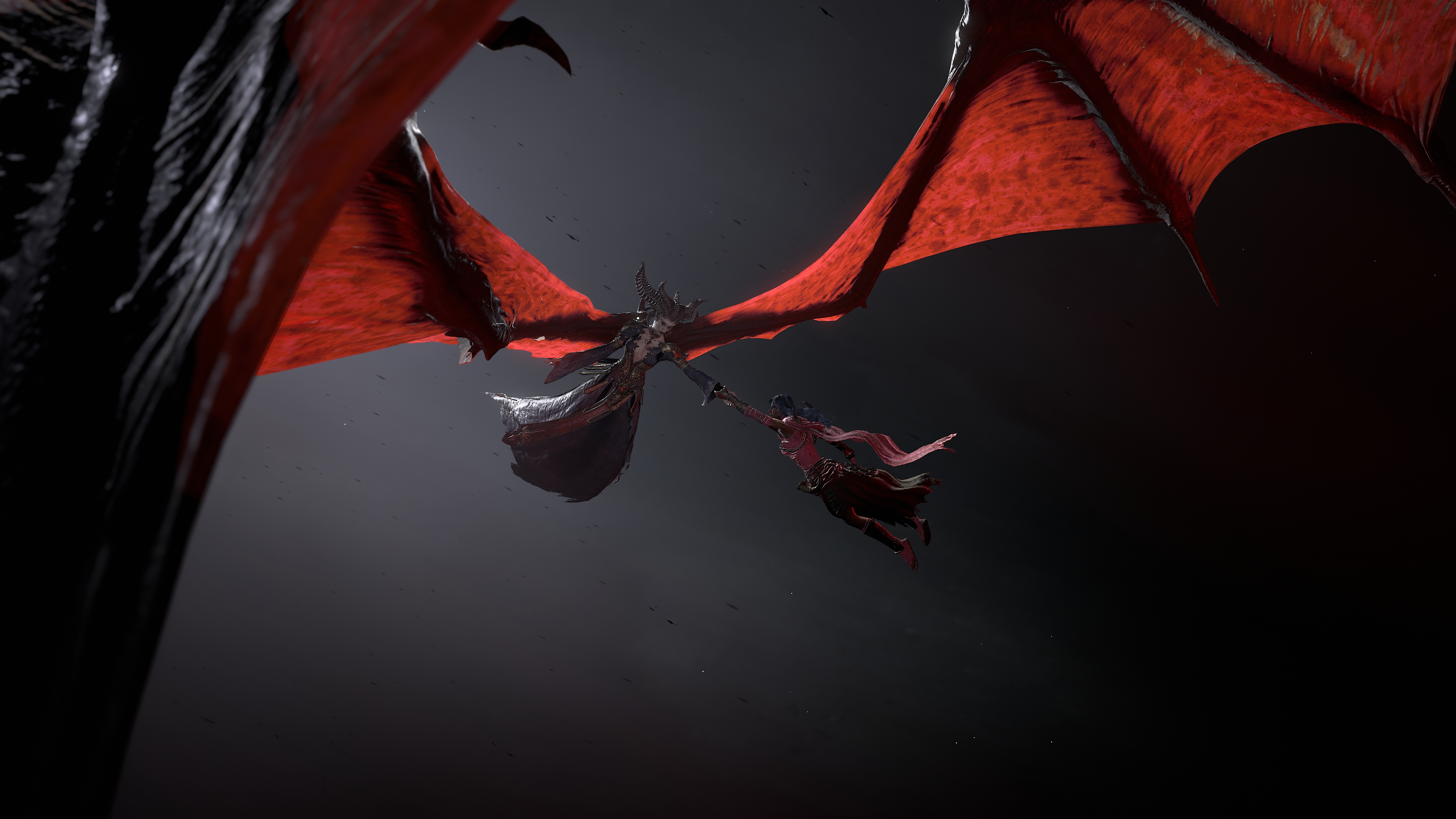 A screenshot from the Diablo 4: Lord of Hatred review build. A cinematic scene where the player character is rescued by the demon Lilith in a black void.