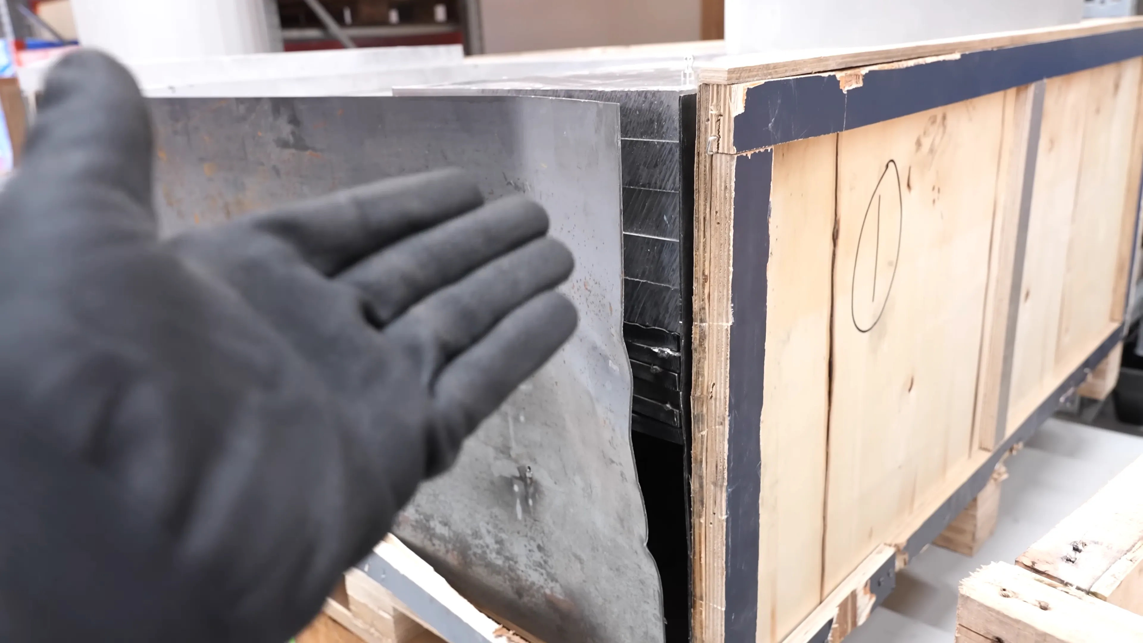 A screenshot of a Der8auer video, in which Thermal Grizzly's Roman Hartung describes how the company was scammed by copper and aluminium suppliers in China