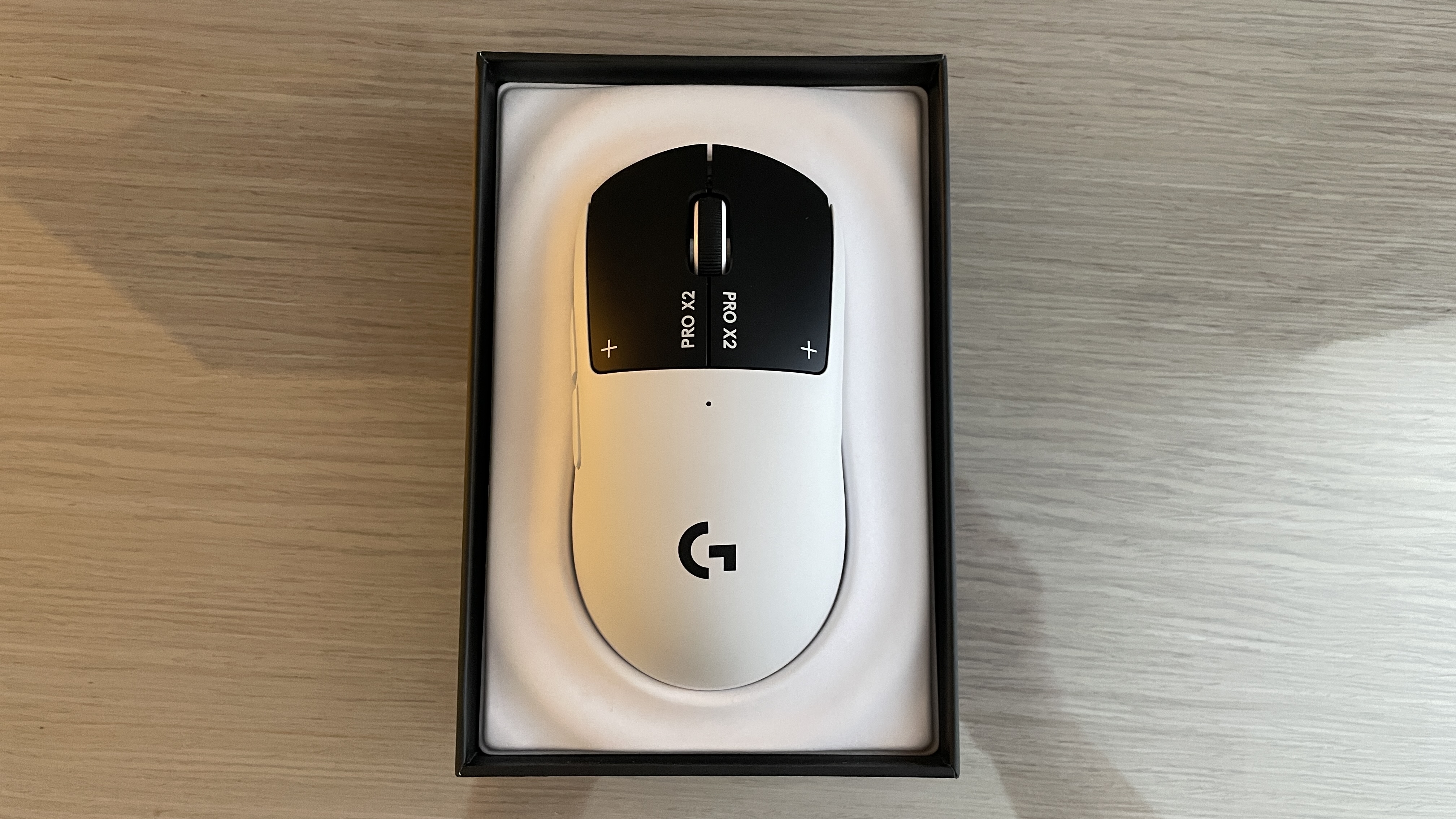 A Logitech G Pro X2 Superstrike gaming mouse.