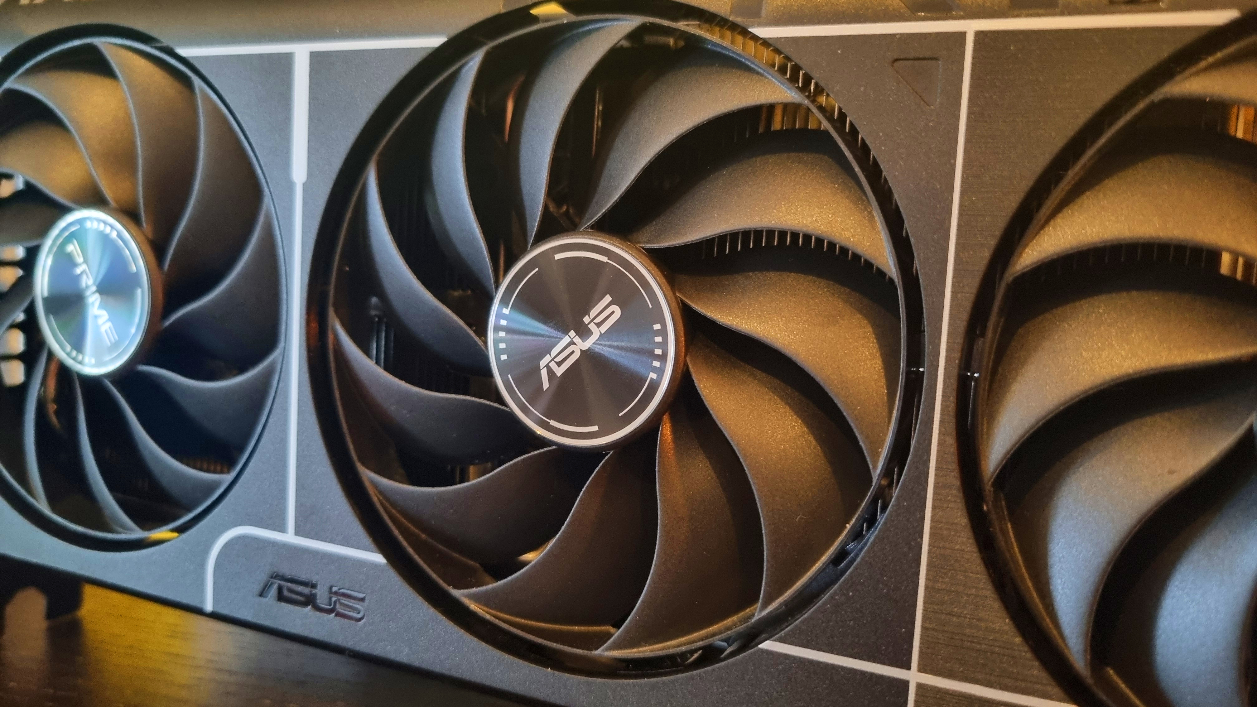 A close up shot of the middle fan on the Asus Prime Radeon RX 9060 XT 8 GB