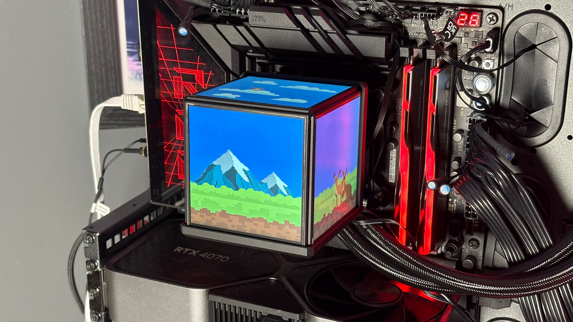 The Thermaltake Minecube 360 Ultra ARGB Sync set up on an open test bench.