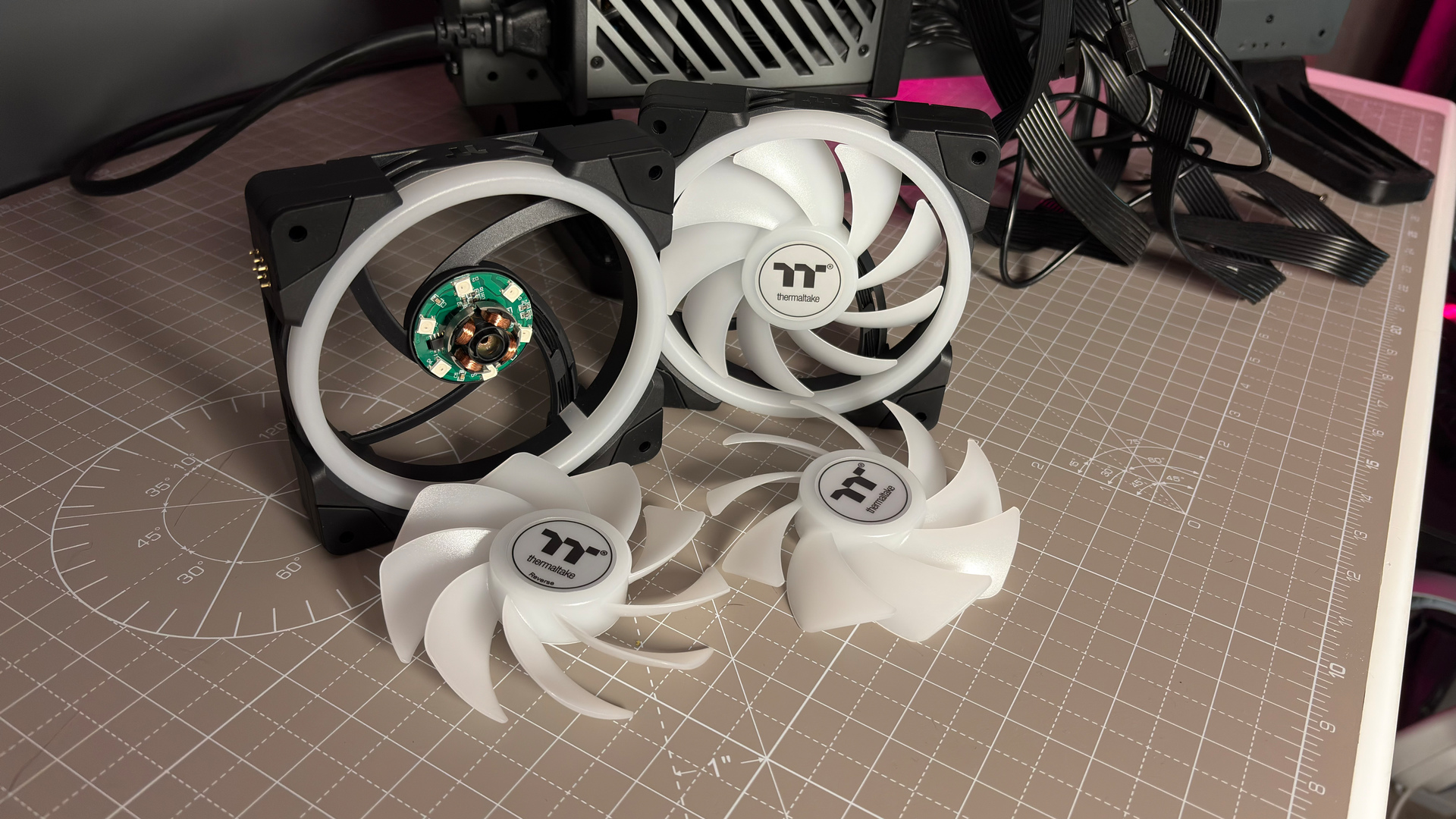 The Thermaltake Minecube 360 Ultra ARGB Sync set up on an open test bench.