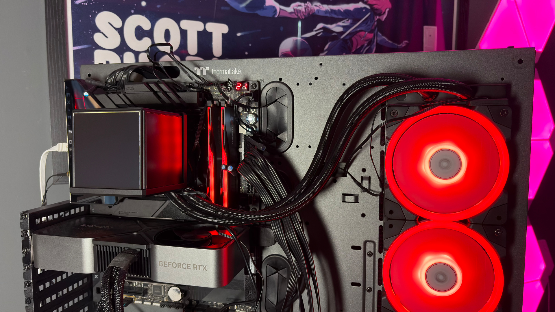 The Thermaltake Minecube 360 Ultra ARGB Sync set up on an open test bench.