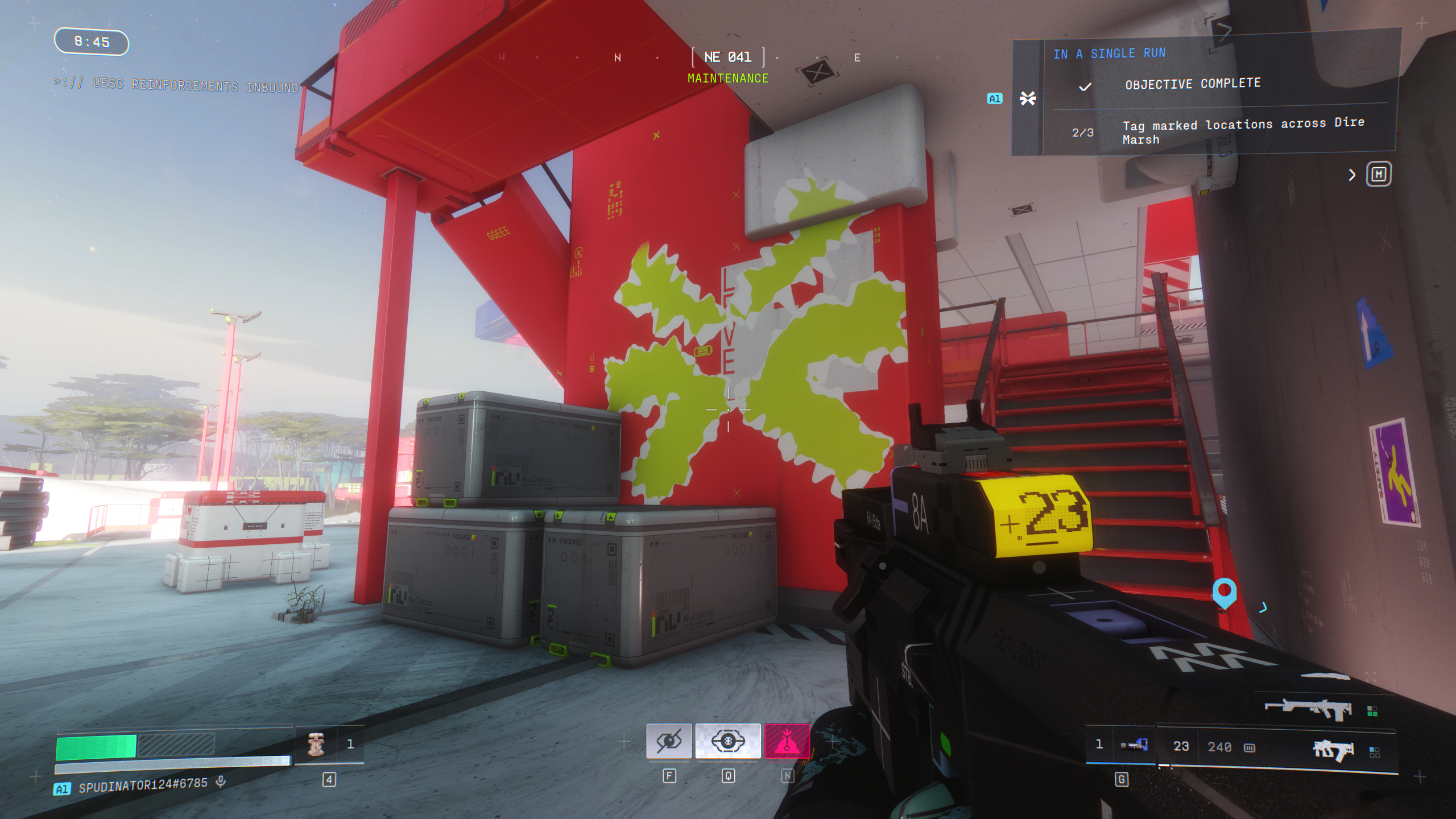 Marathon tag marked locations: A player looking at a red pillar by a staircase, with MIDA's symbol painted on.