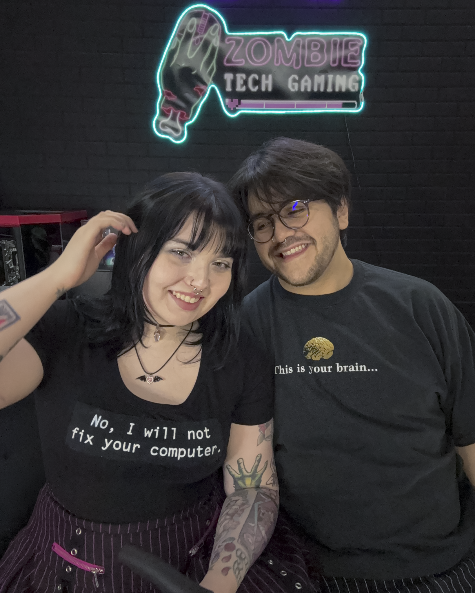 Zoë Baye and Brandon Ayala are seen in their garage work space. The pair form the prebuilt PC business Zombie Tech Gaming.