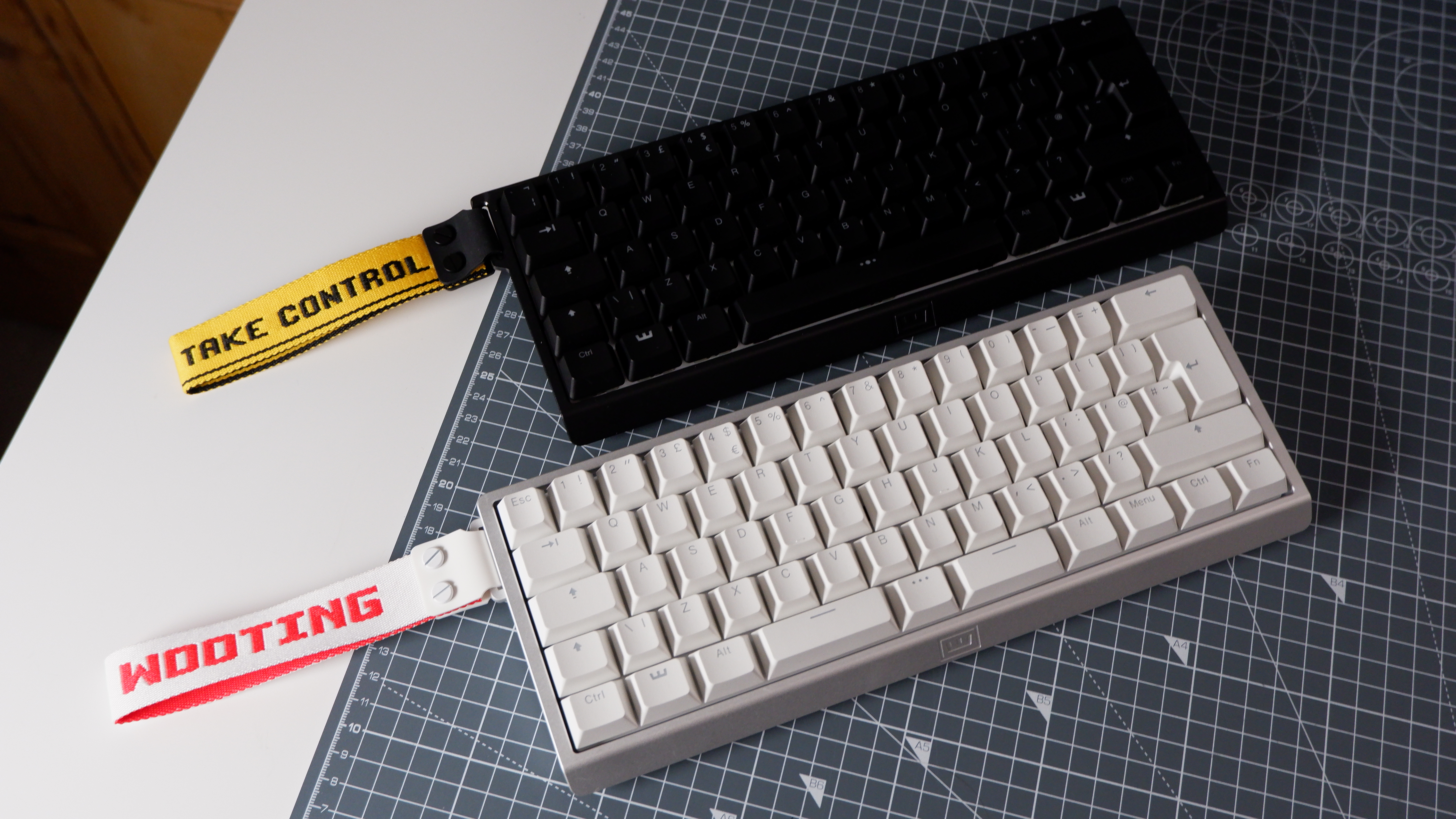 The Wooting 60HE v2 at various stages of being built.