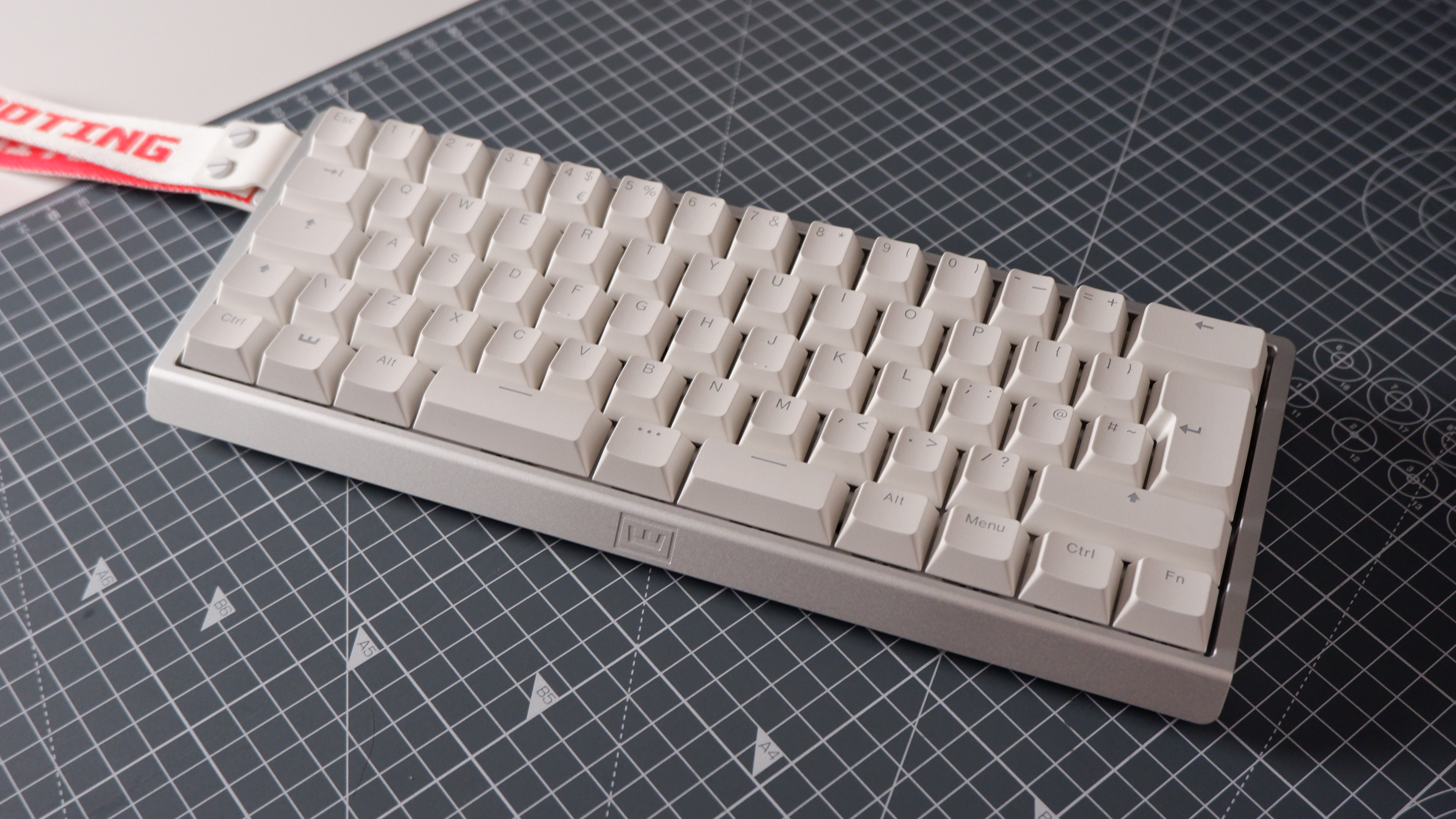 The Wooting 60HE v2 at various stages of being built.