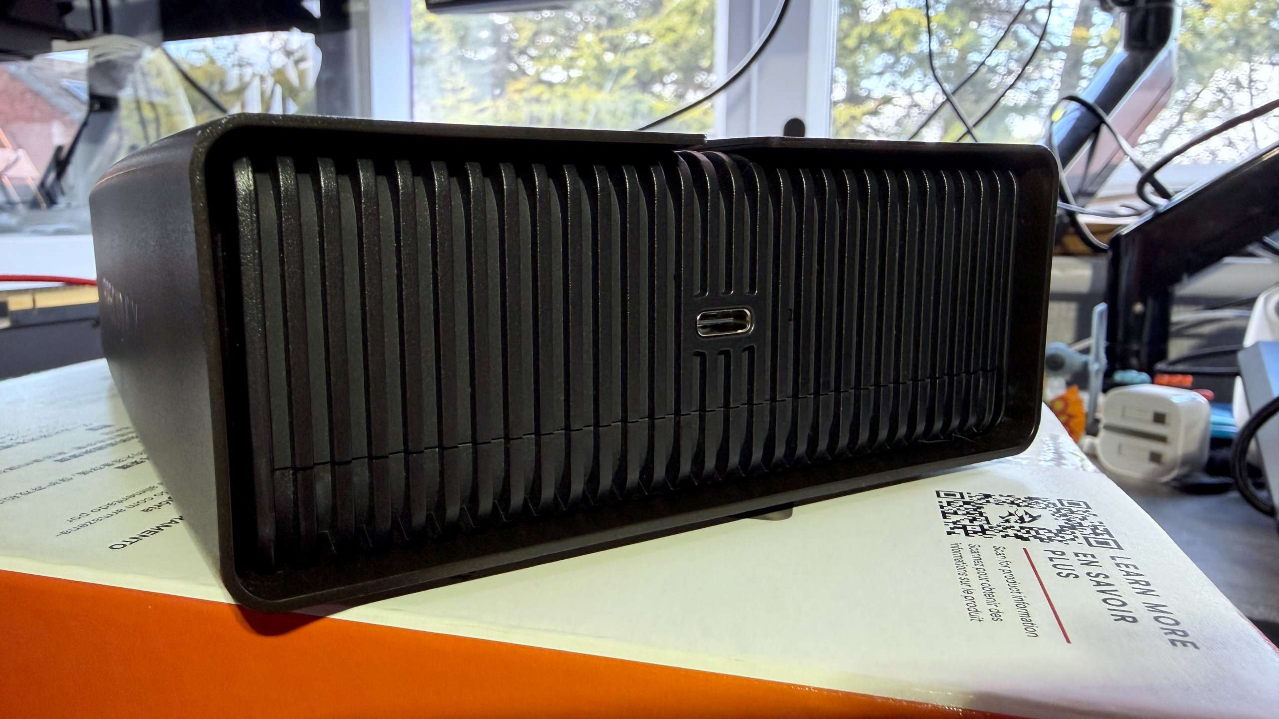 A close-up photo of a Seagate FireCuda X Vault external hdd, showing its USB Type-C port