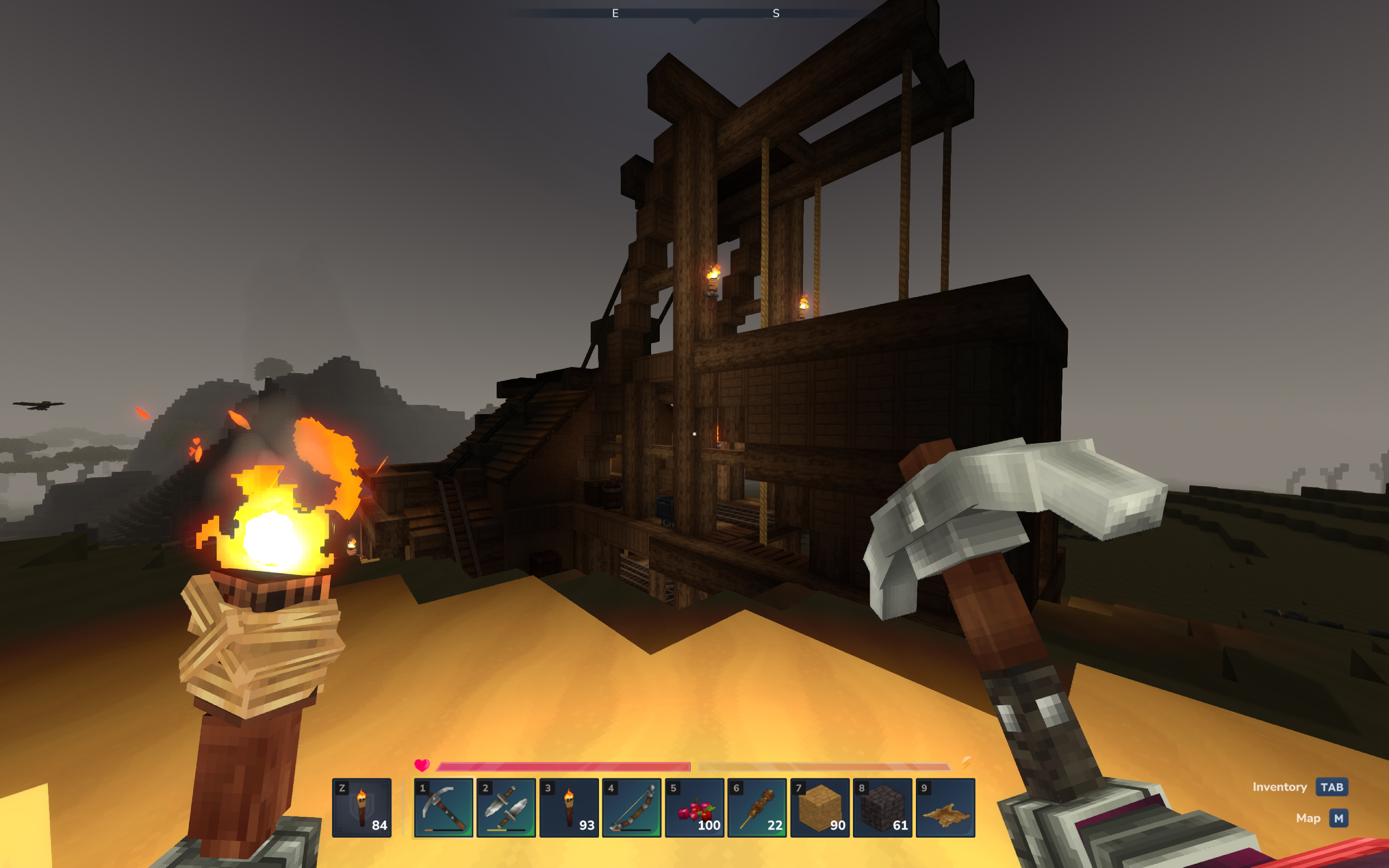 Hytale cobalt: A player looking at an abandoned mineshaft in a desert at night.