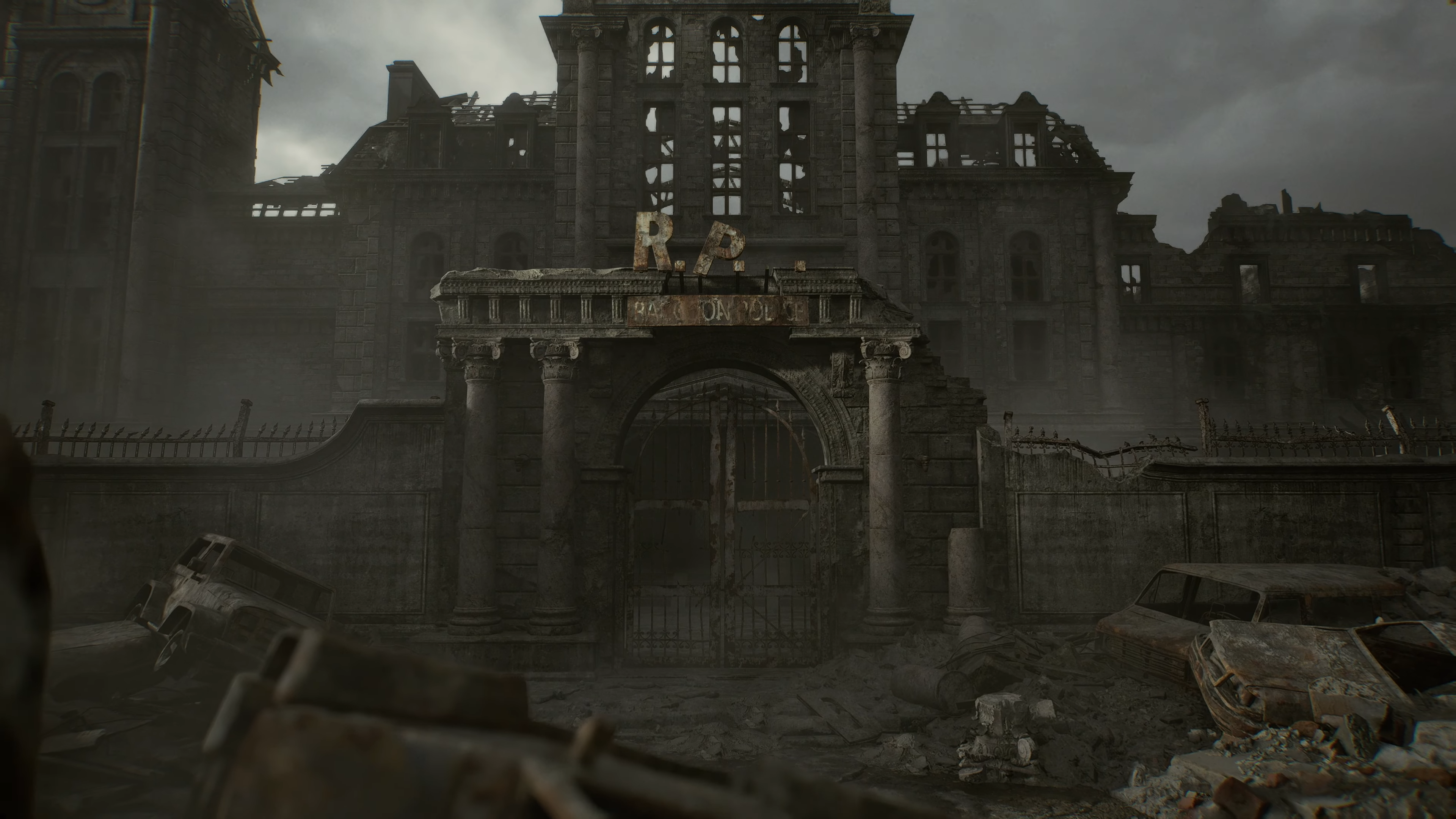 The ruined gates of the Raccoon City Police Department in Resident Evil Requiem.