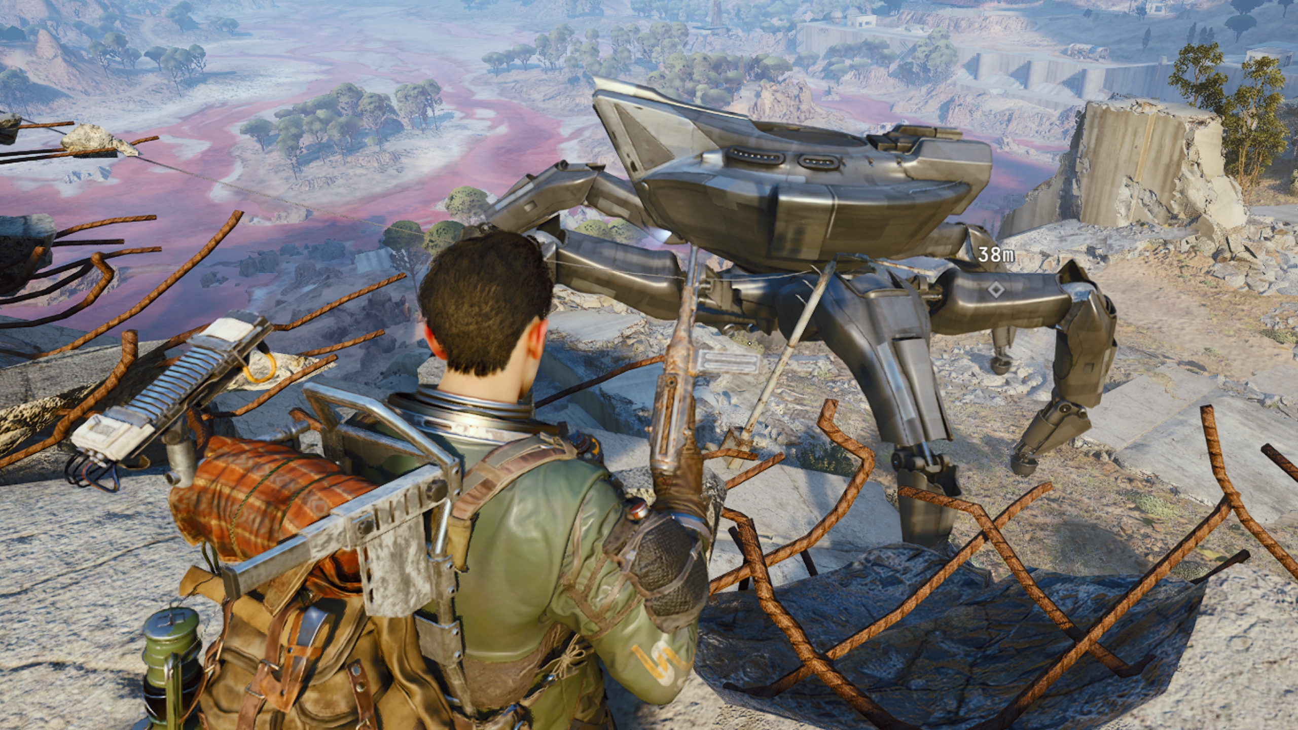 Arc Raiders Matriarch: A player holding a Stitcher in their right hand while looking down at a Matriarch in the broken section of the dam.